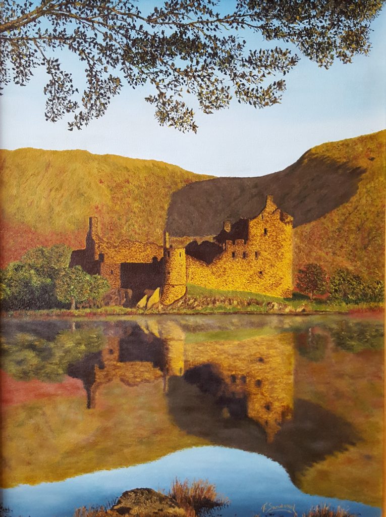 Castillo de Evening Kilchurn, en Escocia, donde se refleja este maravilloso lugar, en el cual destaca el reflejo del castillo sobre el lago Awe.