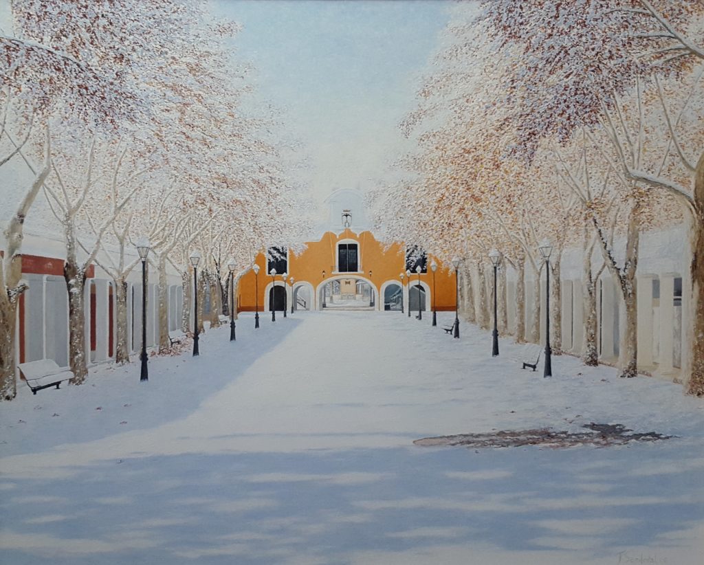 Capilla de la Virgen de los Llanos, en la Feria de Albacete, en una nevada, incidiendo la luz del sol en la nieve con sus sobras y los plataneros.