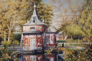 De la casita del pescador, situada en el parque del Retiro, destacar los reflejos en el estanque, la barandilla y la sombra de los árboles sobre la fachada.